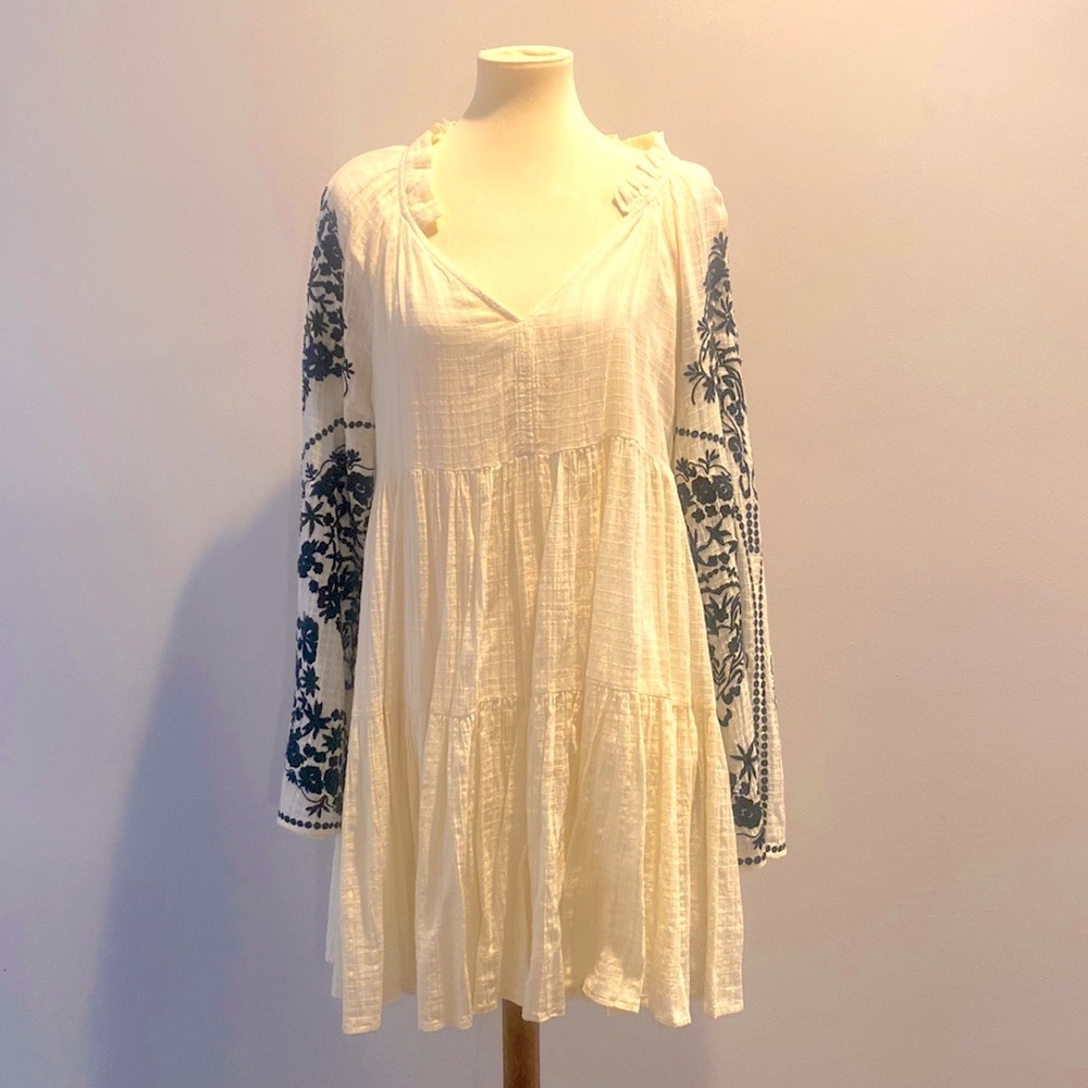 Free People trapeze dress with flared sleeves.